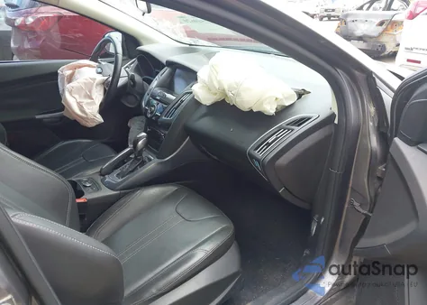 2014 Ford Focus Titanium from USA, damaged, VIN 1FADP3J25EL154679